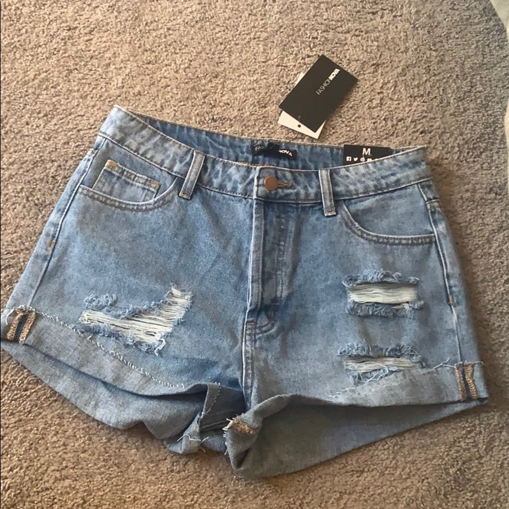 Denim shorts. Never worn